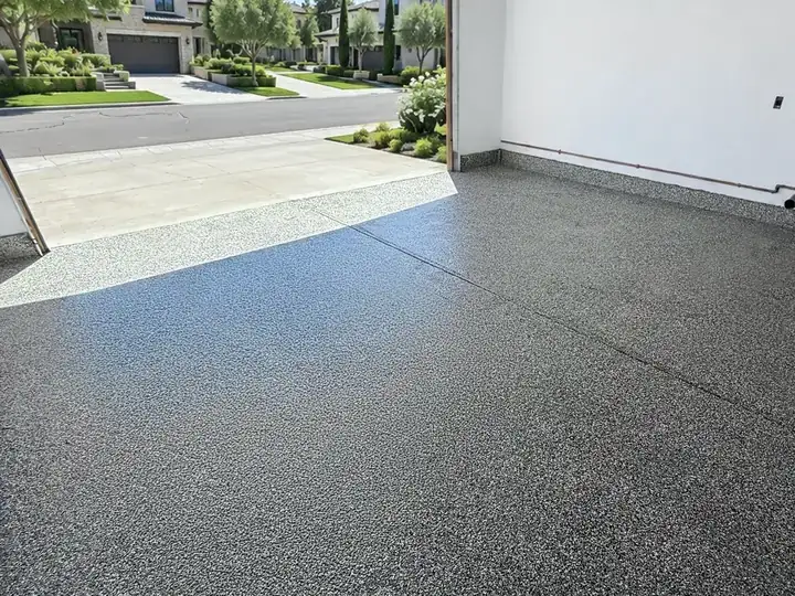 Gray flake epoxy garage floor looking out to the driveway in San Jose, CA